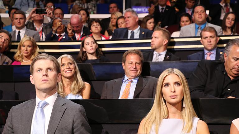 Eric and Ivanka Trump, Donald Trump's children, watch speakers on the second night of the Republican National Convention. (Evan Garcia / Chicago Tonight) Eric and Ivanka Trump, Donald Trump's children, watch speakers on the second night of the Republican National Convention. (Evan Garcia / Chicago Tonight)