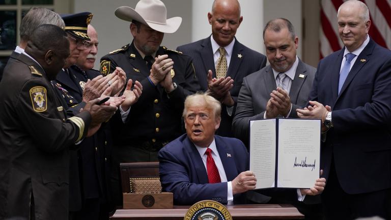Law enforcement officials applaud after President Donald Trump signed an executive order on police reform, in the Rose Garden of the White House, Tuesday, June 16, 2020, in Washington. (AP Photo / Evan Vucci) Law enforcement officials applaud after President Donald Trump signed an executive order on police reform, in the Rose Garden of the White House, Tuesday, June 16, 2020, in Washington. (AP Photo / Evan Vucci)