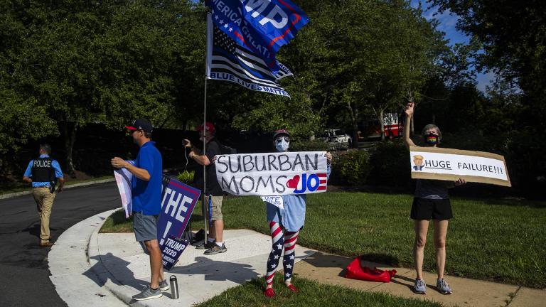 Protesters and supporters of President Donald Trump wave banners as the president's motorcade enters the Trump National Golf Club in Sterling, Va., Sunday, Aug. 23, 2020. (AP Photo / Manuel Balce Ceneta) Protesters and supporters of President Donald Trump wave banners as the president's motorcade enters the Trump National Golf Club in Sterling, Va., Sunday, Aug. 23, 2020. (AP Photo / Manuel Balce Ceneta)