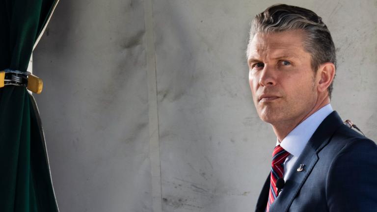 Defense Secretary Pete Hegseth does a television interview outside the White House, Friday, March 21, 2025, in Washington. (AP Photo/Jacquelyn Martin)