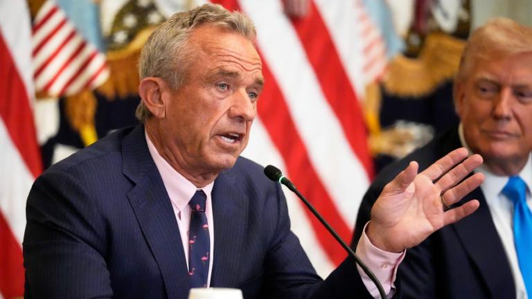 Health and Human Services Secretary Robert F. Kennedy Jr. speaks as President Donald Trump listens at an event to promote his proposal to improve Americans' access to their medical records in the East Room of the White House, Wednesday, July 30, 2025, in Washington. (AP Photo / Mark Schiefelbein)