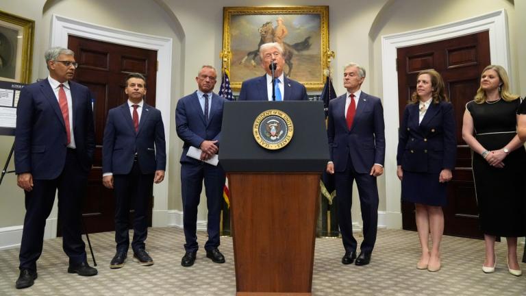 President Donald Trump speaks in the Roosevelt Room of the White House, Monday, Sept. 22, 2025, in Washington, as from left, Dr. Jay Bhattacharya, director of the National Institutes of Health, Dr. Marty Makary, commissioner of the Food and Drug Administration, Health and Human Services Secretary Robert F. Kennedy Jr., Centers for Medicare & Medicaid Services administrator Dr. Mehmet Oz, Dr. Dorothy Fink, acting assistant secretary for health, and Jackie O'Brien, listen. (AP Photo / Mark Schiefelbein)