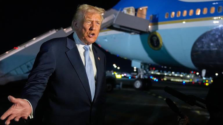 President Donald Trump speaks to reporters before boarding Air Force One at Palm Beach International Airport in West Palm Beach Fla., on his way back to the White House, Sunday, Nov. 16, 2025. (AP Photo / Manuel Balce Ceneta)