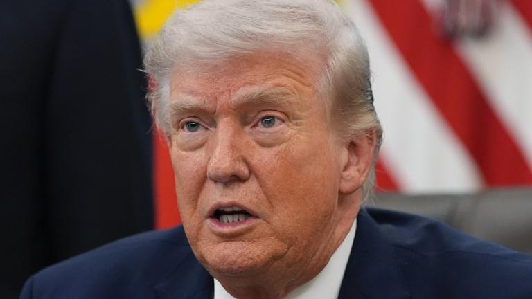 President Donald Trump answers questions from reporters after signing an executive order in the Oval Office of the White House Tuesday, March 31, 2026, in Washington. (AP Photo / Alex Brandon)