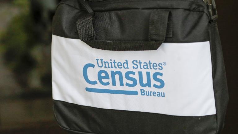 FILE - A briefcase of a census taker is seen as she knocks on the door of a residence, Aug. 11, 2020, in Winter Park, Fla. (AP Photo / John Raoux, File)