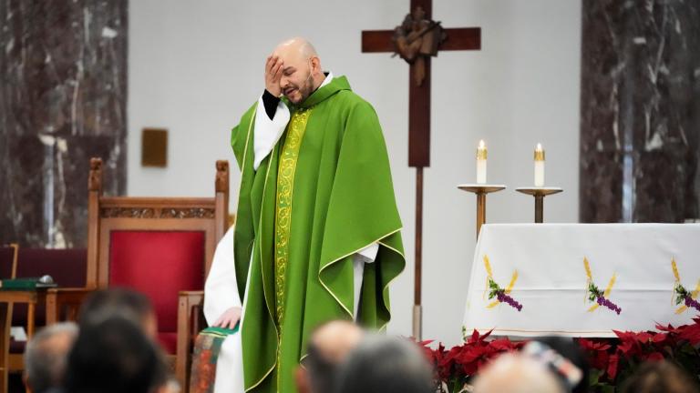 Priest Homero Sanchez reacts as he speaks during a service at St. Rita of Cascia Parish in Chicago, Sunday, Jan. 19, 2025. (AP Photo / Nam Y. Huh)