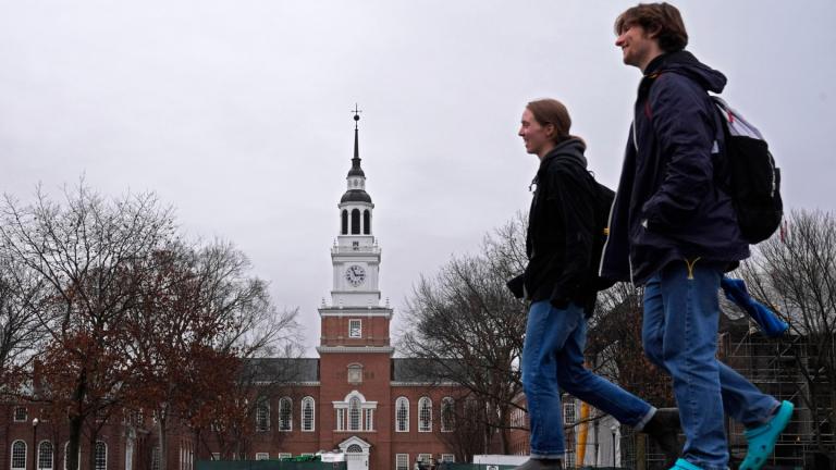 Students cross the campus of Dartmouth College, March 5, 2024, in Hanover, N.H. (AP Photo / Robert F. Bukaty, File)