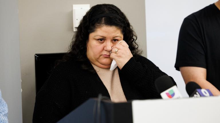Yolanda Orozc wipes away a tear as she speaks about the arrest of her husband, Abel Orozco, during a press conference to announce a court action to prevent unlawful arrests the at the offices of the National Immigrant Justice Center Monday, March 17, 2025, in Chicago. (Anthony Vazquez / Chicago Sun-Times via AP)