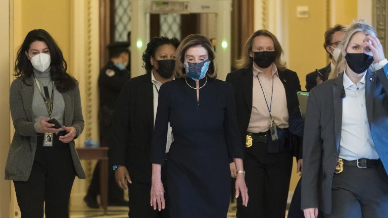 Speaker of the House Nancy Pelosi, D-Calif., returns to her leadership office after opening debate on the impeachment of President Donald Trump, at the Capitol in Washington, Wednesday, Jan. 13, 2021. (AP Photo / J. Scott Applewhite)