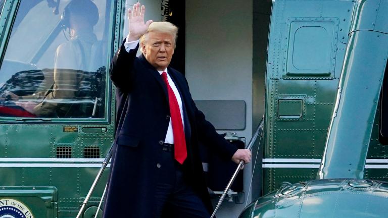 In this Wednesday, Jan. 20, 2021, file photo, President Donald Trump waves as he boards Marine One on the South Lawn of the White House, in Washington, en route to his Mar-a-Lago Florida Resort. (AP Photo / Alex Brandon, File)