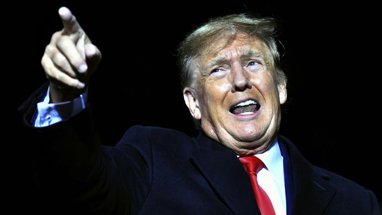 Former President Donald Trump speaks during a rally for Georgia GOP candidates at Banks County Dragway in Commerce, Ga., March 26, 2022. (Hyosub Shin / Atlanta Journal-Constitution via AP)