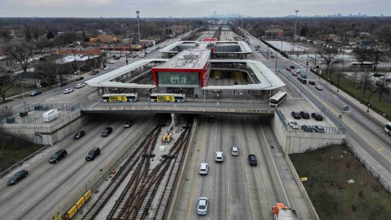 FILE - Cars pass the 95th Street Red Line Station, the train station currently the farthest south on the line and where the Chicago Transit Authority plans to extend from in 2025, Thursday, Dec. 19, 2024, in Chicago. (Erin Hooley / AP Photo, File)