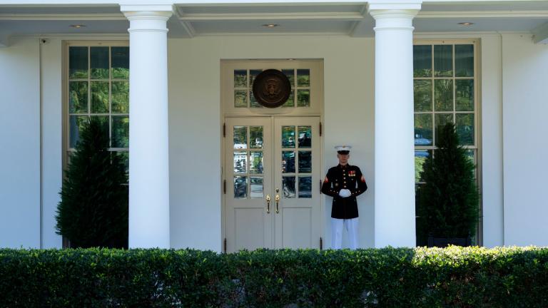 A Marine is posted outside the West Wing of the White House, signifying the President is in the Oval Office, Wednesday, Oct. 7, 2020, in Washington. (AP Photo / Evan Vucci)