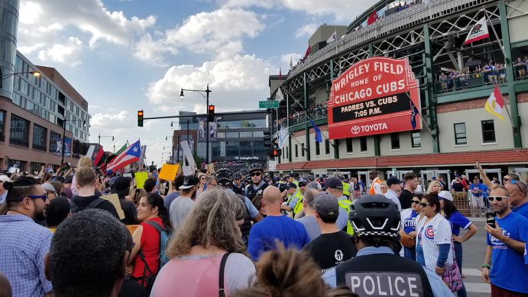 Protesters arrive at Wrigley Field. (Matt Masterson / Chicago Tonight)