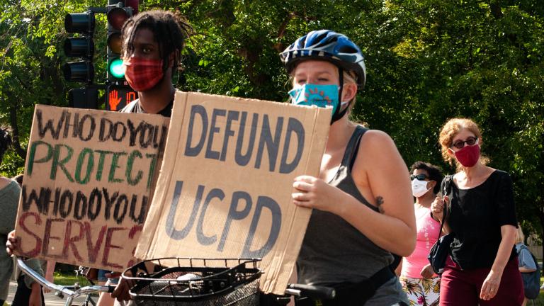 Activists in support of defunding the University of Chicago Police Department participate in a march on Saturday, Aug. 29, 2020. (Grace Del Vecchio / WTTW News)