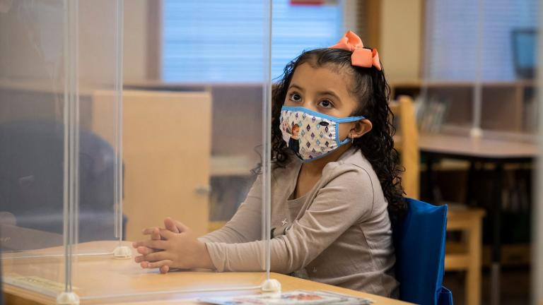 A preschool student listens as her teacher talks during class at Dawes Elementary School at 3810 W. 81st Place on the Southwest Side, Monday morning, Jan. 11, 2021. (Ashlee Rezin Garcia / Chicago Sun-Times / Pool)