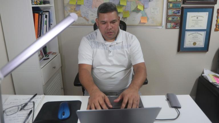 José Palma, a 48 year-old Salvadoran who has lived in the U.S. since 1998, works in home in Texas on Wednesday, Jan. 8, 2025. (AP Photo / Lekan Oyekanmi)