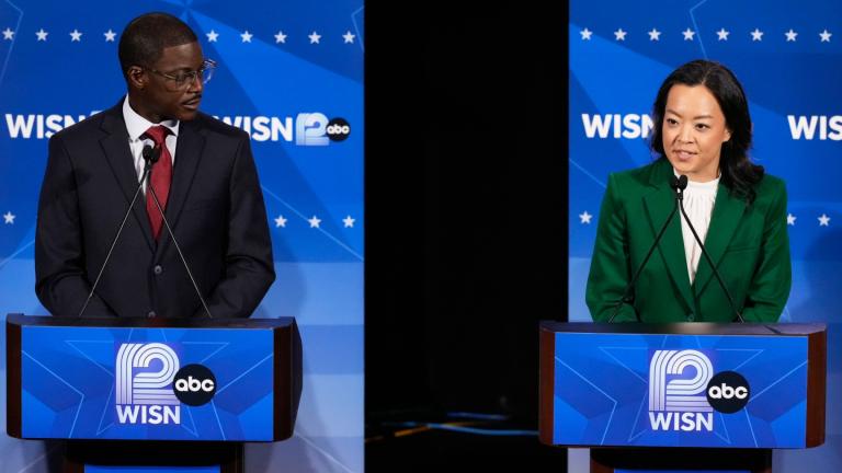 Democratic gubernatorial candidate Francesca Hong, right, talks as David Crowley listens during a primary debate in Milwaukee, Tuesday, July 28, 2026. (AP Photo / Nam Y. Huh)