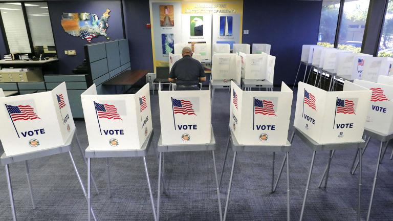 In this March 17, 2020, file photo, a voter casts his ballot during Florida's primary election at the Orange County Supervisor of Elections office in Orlando, Fla. (Joe Burbank / Orlando Sentinel via AP, File)