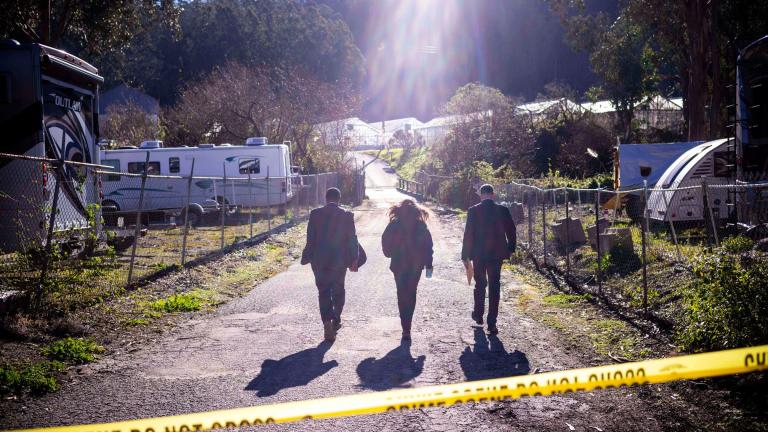 FBI officials walk towards the crime scene at Mountain Mushroom Farm, Tuesday, Jan. 24, 2023, in Half Moon Bay, Calif. A 66-year-old man was charged with killing seven people in back-to-back shootings at two mushroom farms. (AP Photo / Aaron Kehoe, File, File)