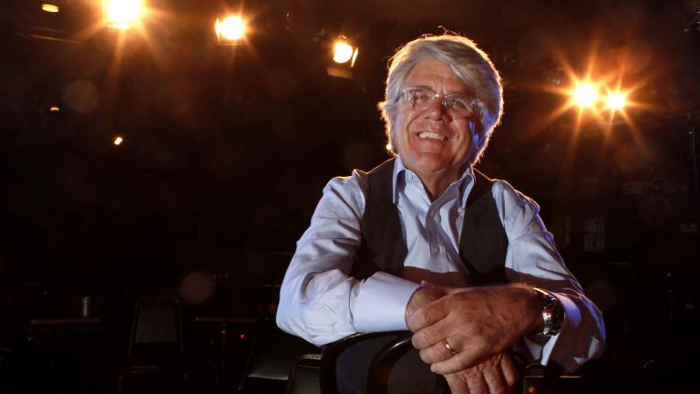 In this Nov. 18, 2009, file photo, co-chairman and chief executive officer Andrew Alexander sits onstage at The Second City in Chicago. Alexander said Friday, June 5, 2020, that he is stepping down after a former performer leveled accusations of racism against the comedy institution. (AP Photo / Charles Rex Arbogast, File)