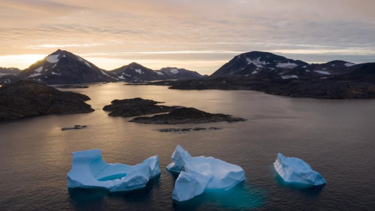 Large Icebergs float away as the sun rises near Kulusuk, Greenland, Aug. 16, 2019. (AP Photo / Felipe Dana, File)