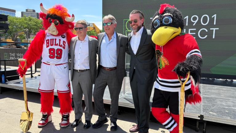 From left, Benny the Bull, Chicago Bulls President and CEO Michael Reinsdorf, United Center CEO Terry Savarise, Chicago Blackhawks Chairman and CEO Danny Wirtz and Tommy Hawk during a groundbreaking event for the 1901 Project at the United Center on June 3, 2026. (Eunice Alpasan / WTTW News)