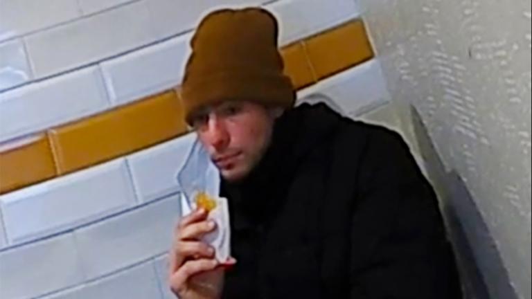 This image release by Pennsylvania State Police shows a video image of Luigi Mangione, a suspect in the fatal shooting of UnitedHealthcare CEO Brian Thompson, at a McDonald's in Altoona, Pa., Monday, Dec. 9, 2024. (Pennsylvania State Police via AP)