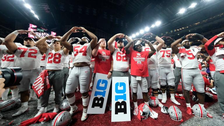 In this Dec. 8, 2019, file photo, Ohio State players celebrate the team’s 34-21 win over Wisconsin in the Big Ten championship NCAA college football game, in Indianapolis. (AP Photo / AJ Mast, File)