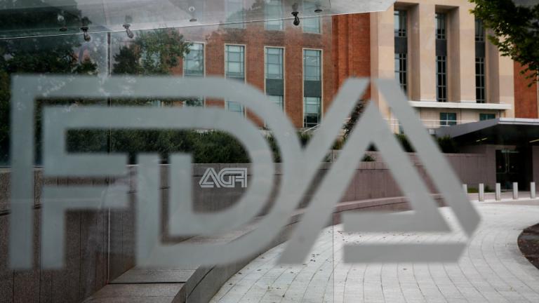 This Thursday, Aug. 2, 2018, file photo shows the U.S. Food and Drug Administration building behind FDA logos at a bus stop on the agency’s campus in Silver Spring, Md. (AP Photo / Jacquelyn Martin, File)