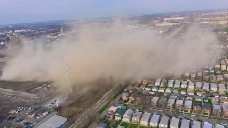 A still image from a video taken of the demolition of the Crawford Coal Plant smokestack, April 11, 2020. (Courtesy of Alejandro Reyes)