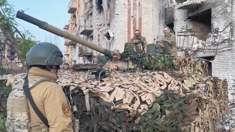 Yevgeny Prigozhin is pictured near a tank. (CNN)