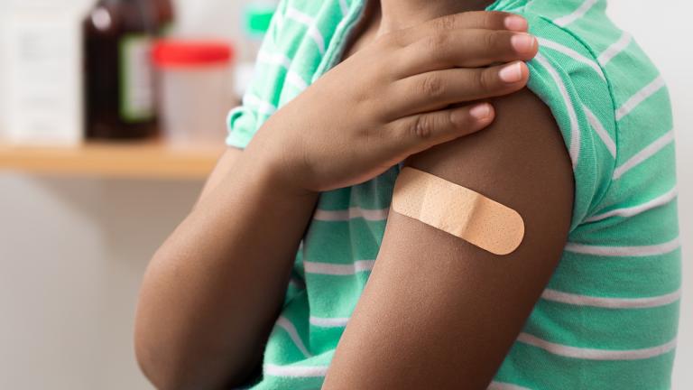 A child receives a vaccine in a file photo. (iStock)