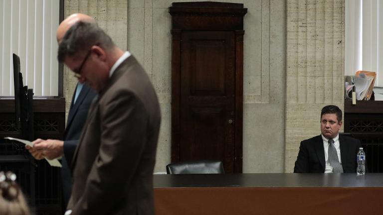 Chicago police Officer Jason Van Dyke listens while attorneys step before Judge Vincent Gaughan’s bench on Friday, Oct. 5, 2018. (Antonio Perez / Chicago Tribune / Pool)