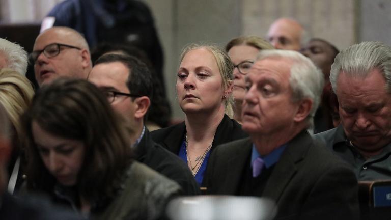 Tiffany Van Dyke, center, watches as verdicts are read in the murder trial of her husband, Chicago police Officer Jason Van Dyke, on Friday, Oct. 5, 2018. (Antonio Perez / Chicago Tribune / Pool)