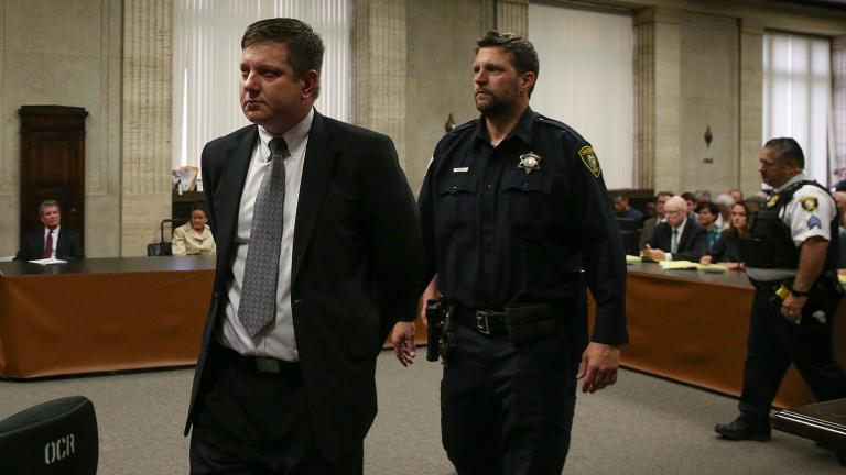 Chicago police Officer Jason Van Dyke is led out of the courtroom following the verdict announcement Friday, Oct. 5, 2018. (Antonio Perez / Chicago Tribune / Pool) 