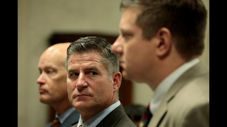 From left: Special prosecutor Joe McMahon, attorney Daniel Herbert and his client, Chicago police Officer Jason Van Dyke, attend a hearing Friday, Aug. 17, 2018. (Antonio Perez / Chicago Tribune)