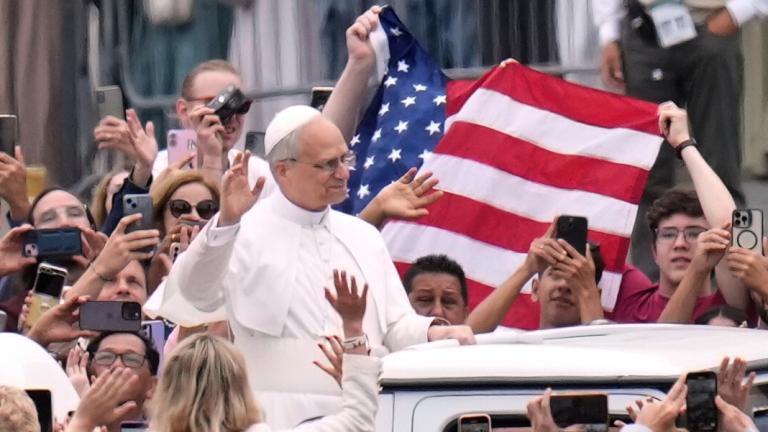 Pope Leo XIV waves as he arrives for his first weekly general audience in St. Peter's Square at The Vatican, Wednesday, May 21, 2025. (AP Photo / Gregorio Borgia)