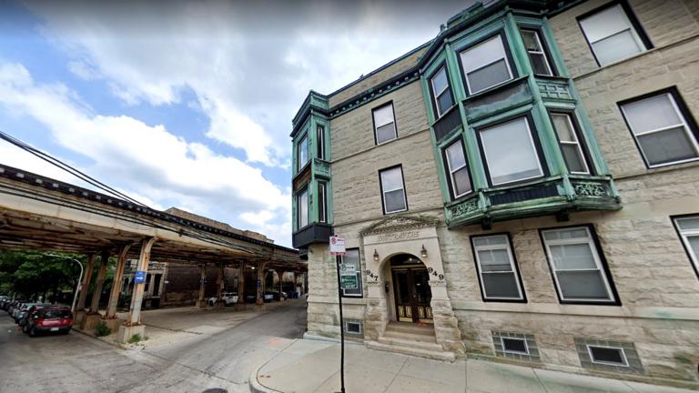 The CTA’s Red-Purple tracks have curved around the Vautravers Building in Lakeview for a century. The agency moved the building to straighten the kink in the system. (Credit: Google Street View)