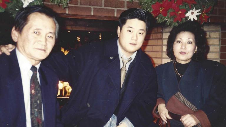 In this undated photo provided by Charlton Rhee, Rhee, a nursing home administrator from New York, poses for a photo with his parents, Man Joon Rhee and Eulja Rhee. Charlton Rhee, whose parents came to the U.S. from South Korea, lost both of them to COVID-19 as the virus surged in New York City.  (Courtesy of Charlton Rhee via AP)