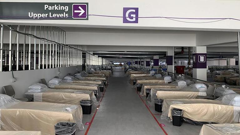 Hospital beds sit inside Renown Regional Medical Center’s parking garage, which has been transformed into an alternative care site for COVID-19 patients in Reno, Nev., on Wednesday, Nov. 11, 2020. (Lucia Starbuck / KUNR Public Radio / Report for America via AP) Hospital beds sit inside Renown Regional Medical Center’s parking garage, which has been transformed into an alternative care site for COVID-19 patients in Reno, Nev., on Wednesday, Nov. 11, 2020. (Lucia Starbuck / KUNR Public Radio / Report for America via AP)
