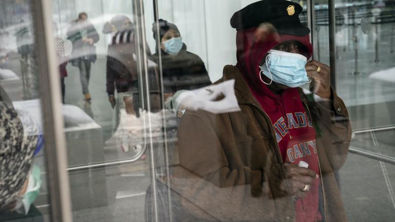 In this Feb. 3, 2021, file photo, a patient adjusts his face mask as he leaves a COVID-19 vaccination site inside the Jacob K. Javits Convention Center in New York. (AP Photo/John Minchillo, File) In this Feb. 3, 2021, file photo, a patient adjusts his face mask as he leaves a COVID-19 vaccination site inside the Jacob K. Javits Convention Center in New York. (AP Photo/John Minchillo, File)