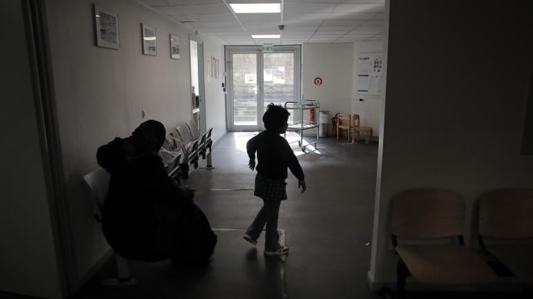 A child and his mother wait at the reception in the pediatric unit of the Robert Debre hospital, in Paris, France, Tuesday, March 2, 2021. (AP Photo/Christophe Ena) A child and his mother wait at the reception in the pediatric unit of the Robert Debre hospital, in Paris, France, Tuesday, March 2, 2021. (AP Photo/Christophe Ena)