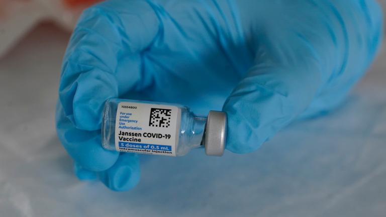 In this March 3, 2021, file photo, U.S. Army medic Kristen Rogers, of Waxhaw, N.C., holds a vial of the Johnson & Johnson COVID-19 vaccine in North Miami, Fla. (AP Photo / Marta Lavandier, File)