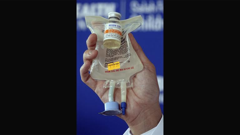 Dr. Aldo Calvo, Medical Director of Family Medicine at Broward Health, shows a Regeneron monoclonal antibody infusion bag during a news conference, Aug. 19, 2021 at the Hospital in Fort Lauderdale, Fla. (Joe Cavaretta / South Florida Sun-Sentinel via AP, File)