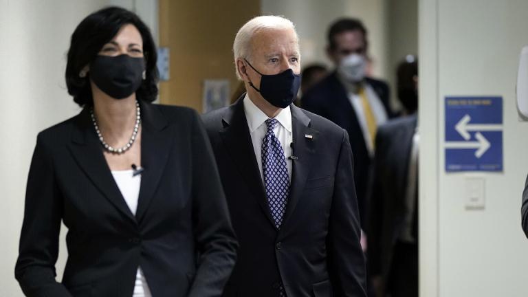 In this March 19, 2021, photo, Dr. Rochelle Walensky, director of the Centers for Disease Control and Prevention, leads President Joe Biden into the room for a COVID-19 briefing at the headquarters for the CDC Atlanta. (AP Photo / Patrick Semansky)