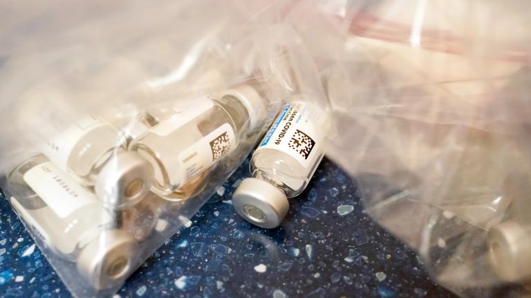 This Wednesday, March 31, 2021 file photo shows empty vials of Johnson & Johnson’s one-dose COVID-19 vaccine at a mobile vaccination site in Uniondale, N.Y. (AP Photo / Mary Altaffer)