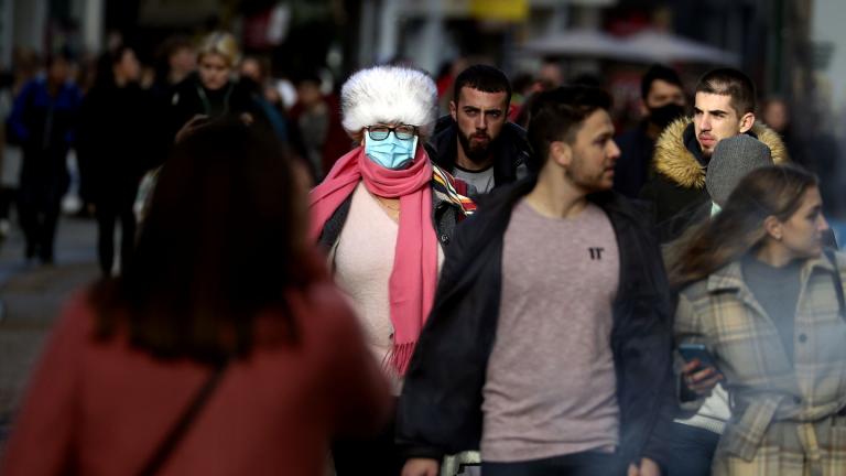 Christmas shoppers in Oxford city centre England, Sunday Dec. 20, 2020. (Steve Parsons / PA via AP)