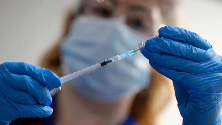 A nurse prepares a shot of the Pfizer-BioNTech COVID-19 vaccine at Guy’s Hospital in London, Tuesday, Dec. 8, 2020, as the U.K. health authorities rolled out a national mass vaccination program. (AP Photo / Frank Augstein, Pool)