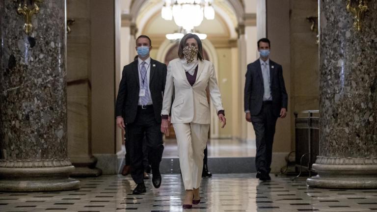 In this April 23, 2020, file photo House Speaker Nancy Pelosi of Calif., walks to her office after signing the Paycheck Protection Program and Health Care Enhancement Act, H.R. 266, after it passed the House on Capitol Hill in Washington. Pelosi shelved a proposal for proxy voting this week after Republicans objected. (AP Photo/Andrew Harnik, File)